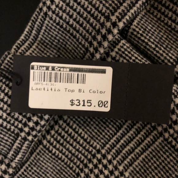 I’m selling a brand new shoulderless top - Picture 2 of 2